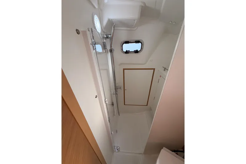 Slide: The Image of Interior of 2025 Jeanneau Sun Odyssey 350 yacht, featuring a modern shower area. - 68