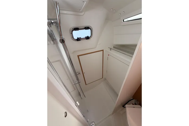 Slide: The Image of Interior of 2025 Jeanneau Sun Odyssey 350 yacht bathroom with modern fixtures. - 69