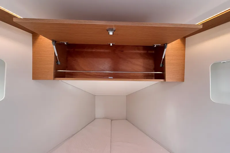 Slide: The Image of Interior cabin storage of 2025 Jeanneau Sun Odyssey 350 yacht. - 83