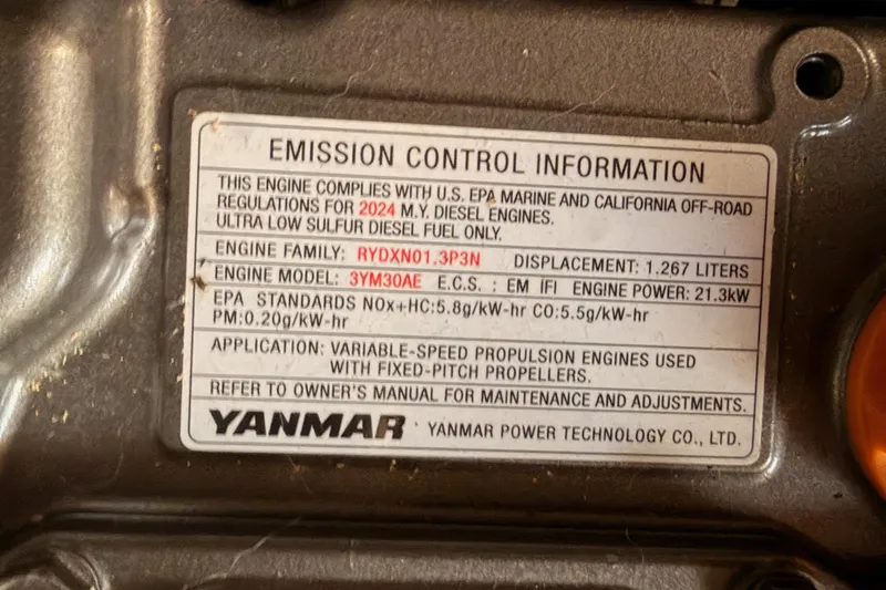 Slide: The Image of Emission control label on Yanmar engine for Jeanneau Sun Odyssey 350, 2025 model. - 92