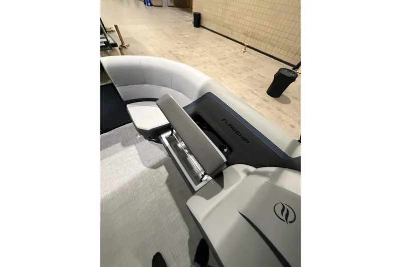 Slide: The Image of 2026 Flagship Discover 22CU boat interior with extended deck, featuring sleek seating design. - 11