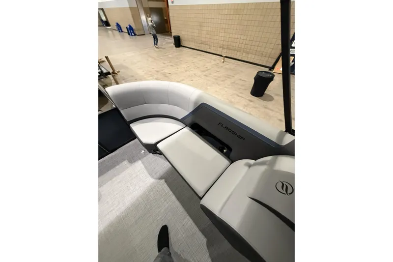Slide: The Image of Interior view of 2026 Flagship Discover 22CU boat with extended deck seating. - 9