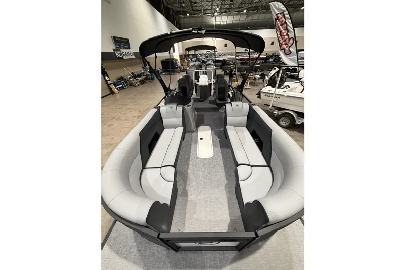 Slide: The Image of 2026 Flagship Discover 22 Rear Fish boat with extended rear deck, spacious seating, and modern design. - 6