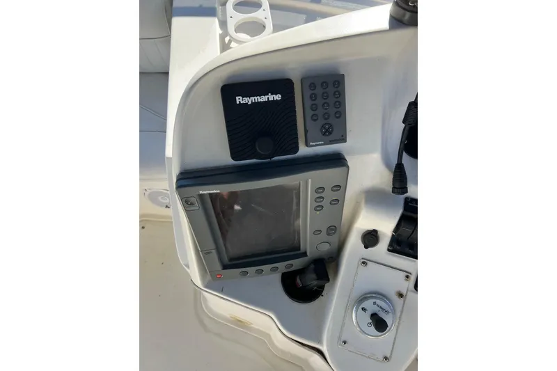 Slide: The Image of 2004 Cruisers Yachts 3750 Motoryacht helm with gauges and steering wheel. - 12