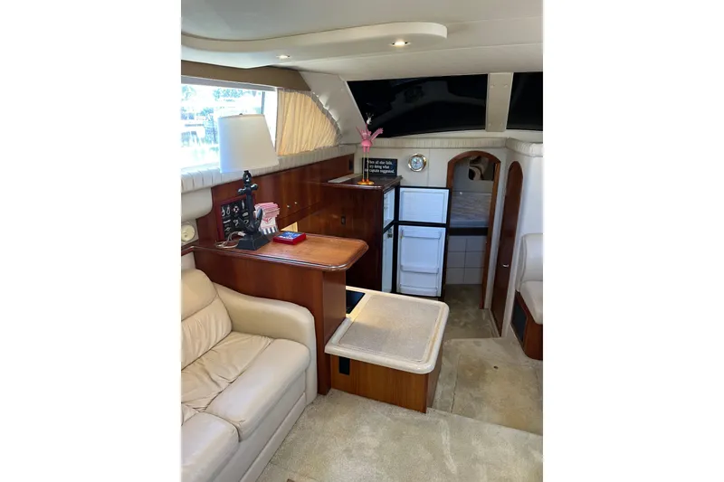 Slide: The Image of Red life jackets stored on a cabinet inside a 2004 Cruisers Yachts 3750 Motoryacht. - 24