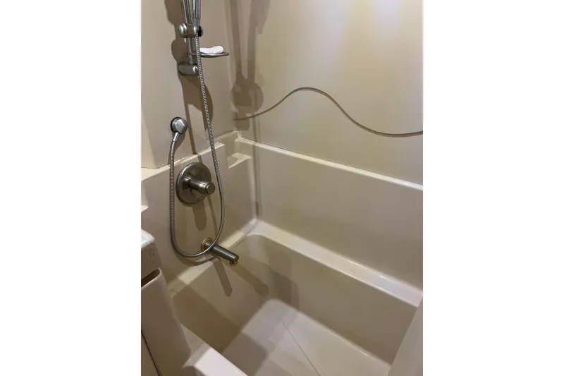 Slide: The Image of Shower area in 2004 Cruisers Yachts 3750 Motoryacht, featuring modern fixtures. - 31