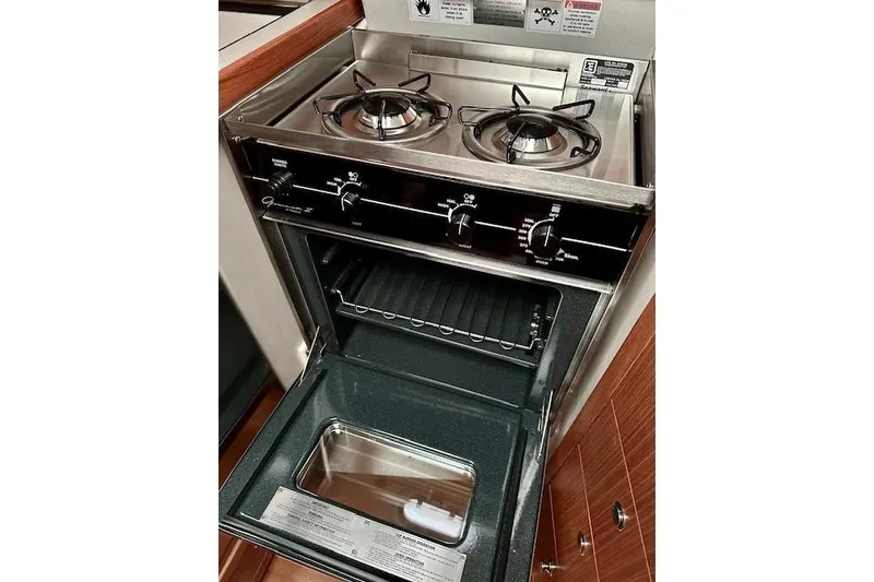Slide: The Image of Stainless steel stove and oven in 2015 Catalina 315 yacht kitchen. - 18
