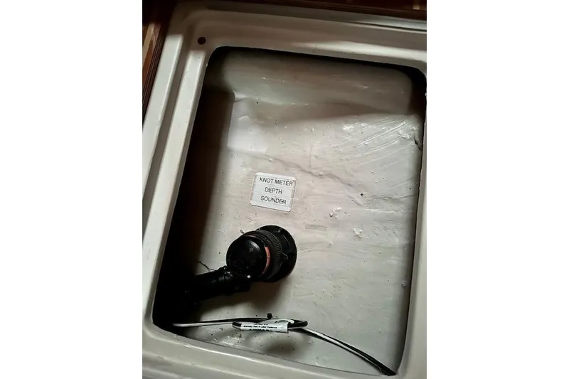 Slide: The Image of Knot meter and depth sounder in 2015 Catalina 315 boat compartment. - 37