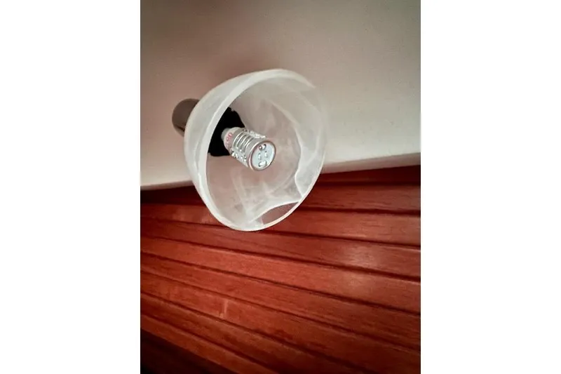 Slide: The Image of Ceiling light fixture inside a 2015 Catalina 315 boat cabin. - 39