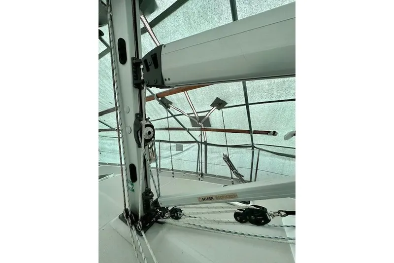 Slide: The Image of Close-up of Catalina 315 sailboat rigging and mast, 2015 model, under a protective cover. - 56