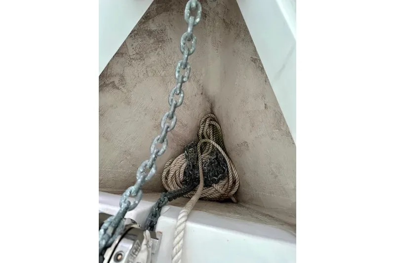 Slide: The Image of Anchor chain and rope in a 2015 Catalina 315 sailboat locker. - 58
