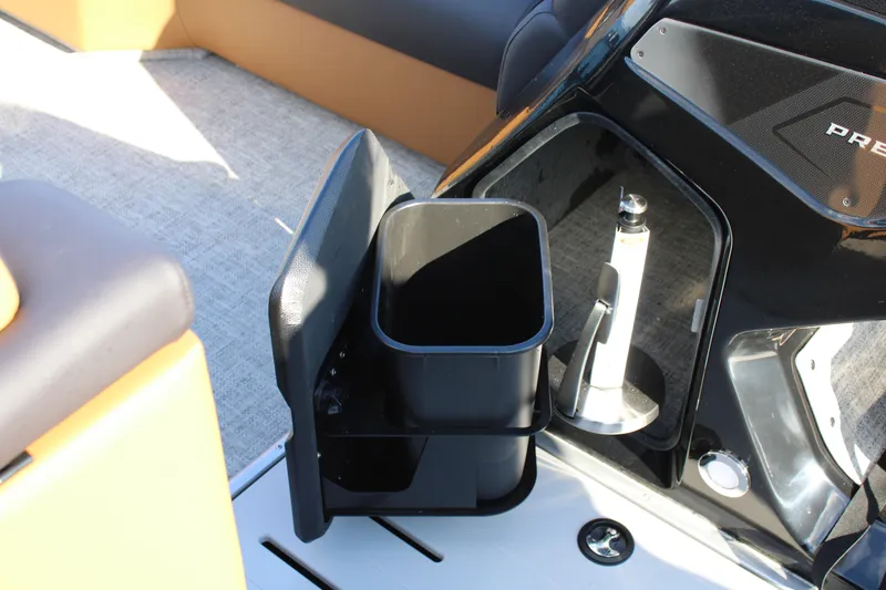 Slide: The Image of 2026 Premier 230 SunSation RF boat interior with storage compartment and sleek design. - 10