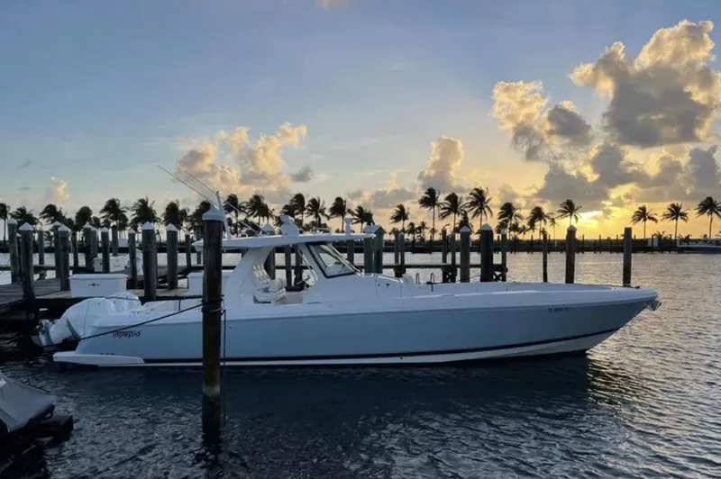 Slide: The Image of Intrepid 407 Nomad SE 2022 at sunset in the harbor. - 31