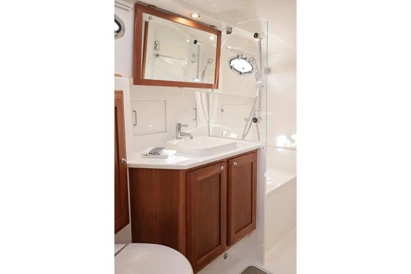 Slide: The Image of Luxurious bathroom in 2023 Back Cove 39O yacht with wooden cabinetry and modern fixtures. - 14