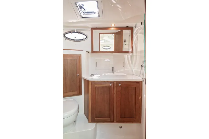 Slide: The Image of Luxurious bathroom in 2023 Back Cove 39O yacht with wooden cabinetry and modern fixtures. - 16