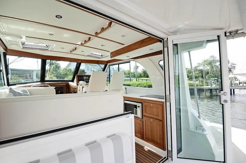 Slide: The Image of Interior of 2023 Back Cove 39O yacht, featuring modern design and spacious seating. - 37