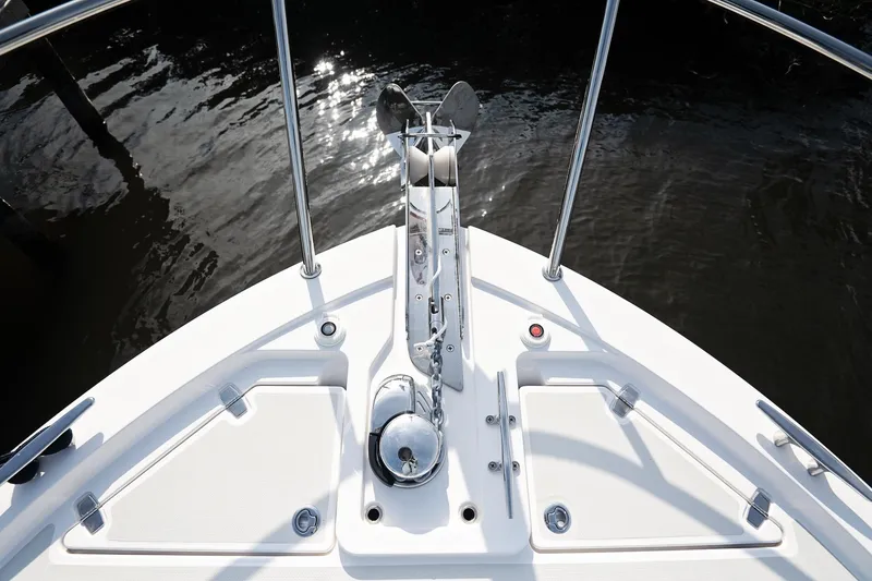 Slide: The Image of Bow of 2023 Back Cove 39O boat with anchor and water reflection. - 48