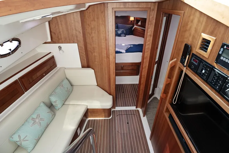 Slide: The Image of Luxurious interior of 2023 Back Cove 39O yacht with cozy seating and modern amenities. - 9