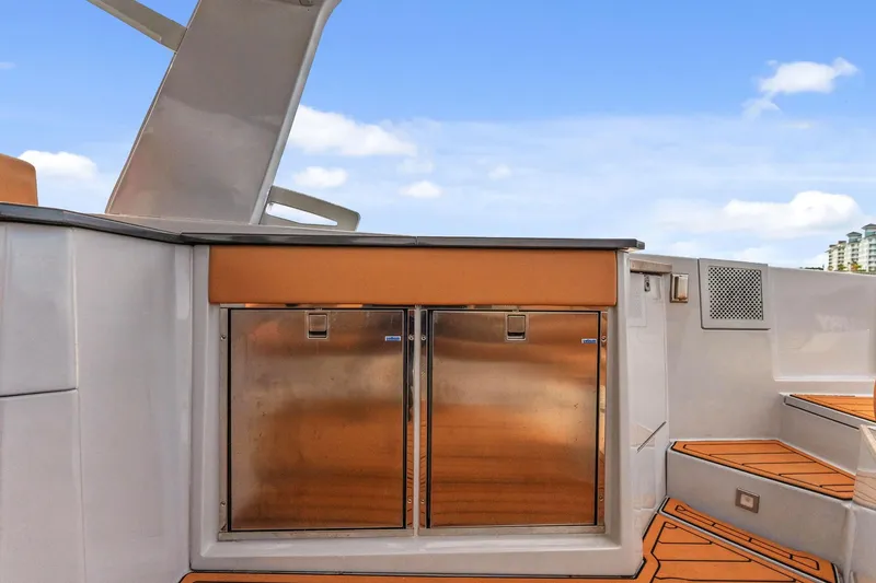 Slide: The Image of 2021 Aviara AV36 OB yacht with sleek outdoor kitchen and stainless steel appliances. - 18