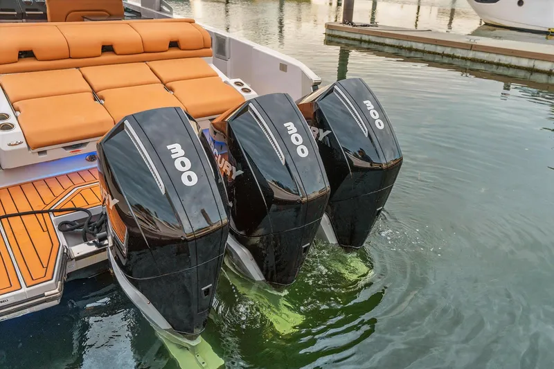 Slide: The Image of 2021 Aviara AV36 OB boat with triple Mercury 300 outboard engines. - 29