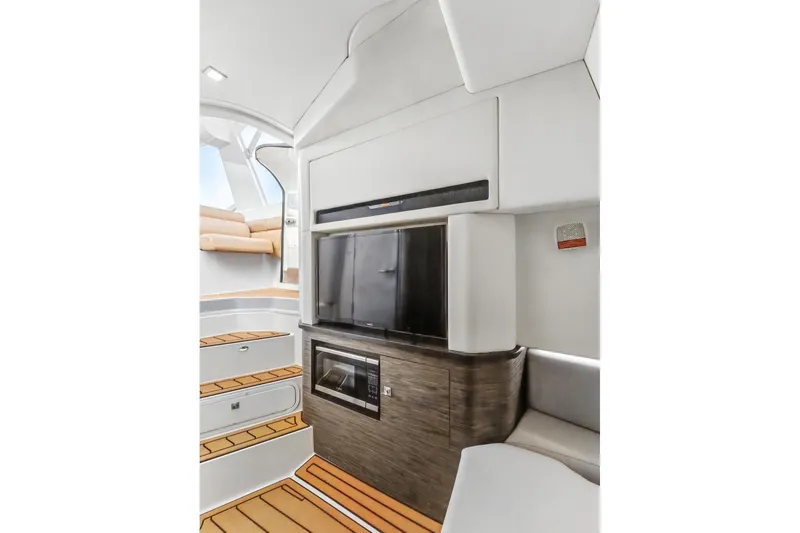 Slide: The Image of Interior of 2021 Aviara AV36 OB boat with modern design and wood accents. - 38