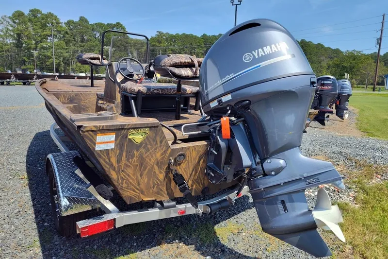 Slide: The Image of 2025 G3 Gator Tough 18 CC boat with Yamaha outboard motor on trailer. - 7