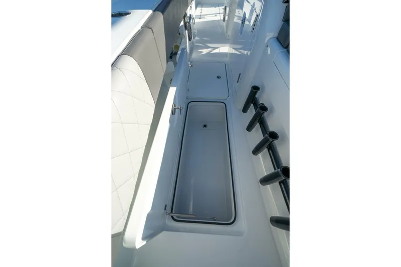 Slide: The Image of 2024 Freeman 38 boat interior with storage compartments and rod holders. - 20