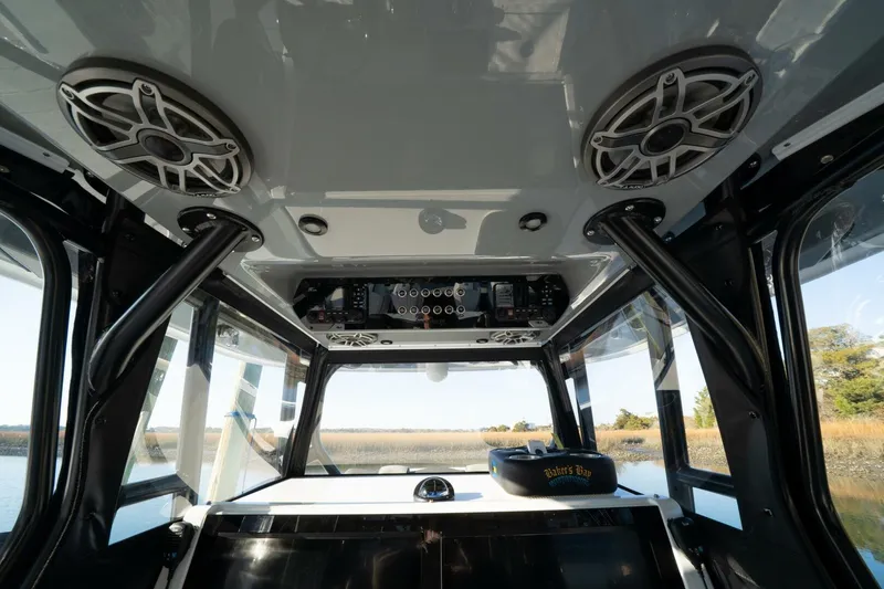 Slide: The Image of Interior view of 2024 Freeman 38 boat with speakers and control panel. - 28