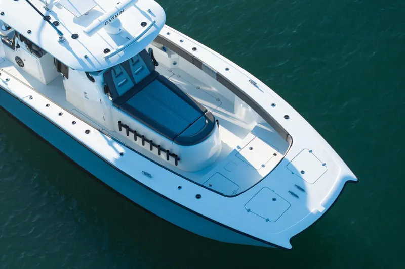 Slide: The Image of 2024 Freeman 38 boat on water, featuring sleek design and spacious deck layout. - 41