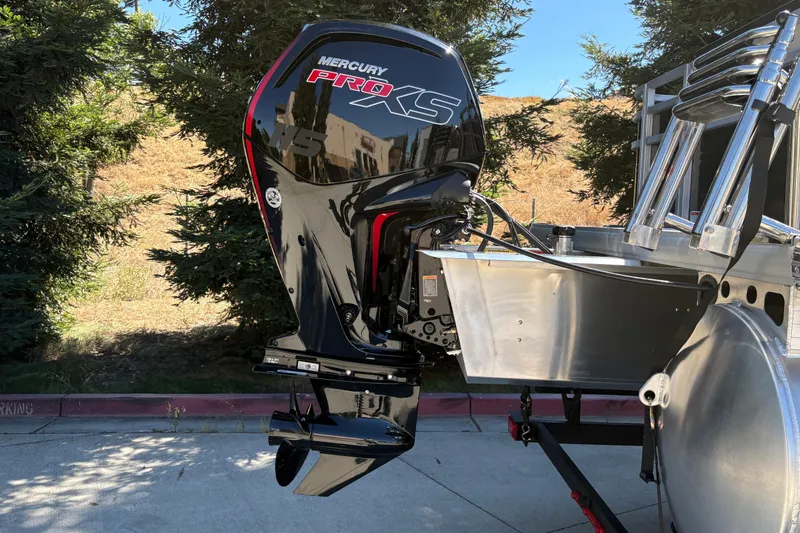 Slide: The Image of 2026 Sun Tracker Fishin' Barge 20 DLX with Mercury Pro XS outboard motor. - 11