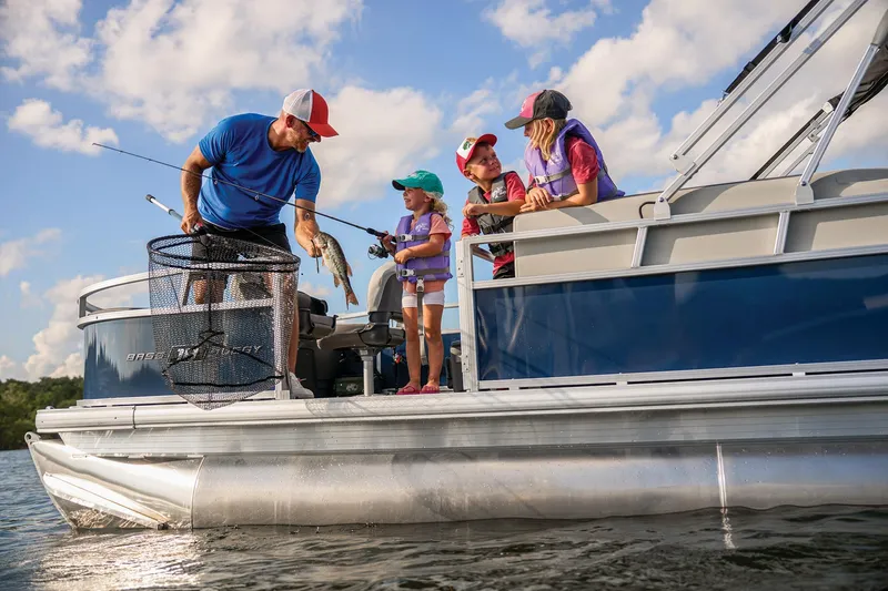 Slide: The Image of 2026 Sun Tracker Bass Buggy 18 DLX pontoon boat interior with swivel seats. - 7