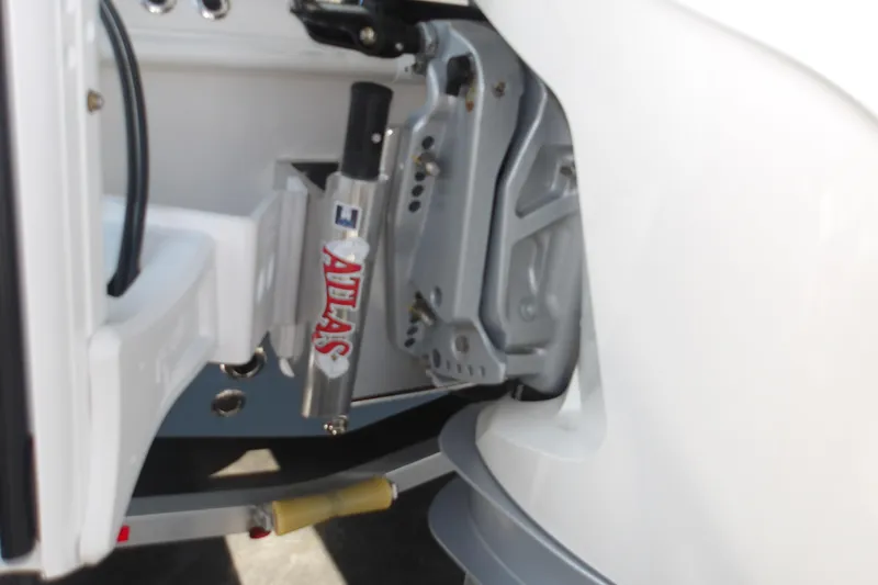 Slide: The Image of Close-up of 2026 Ranger 2360 Bay boat's Atlas hydraulic jack plate. - 7