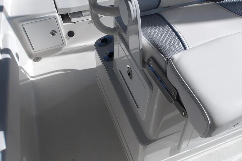 Slide: The Image of Interior of 2026 Ranger 2360 Bay boat featuring sleek seating and storage compartments. - 14