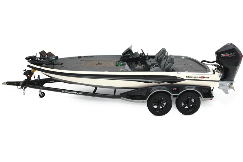Slide: The Image of 2026 Ranger Z520R bass boat with trailer, parked outdoors. - 10