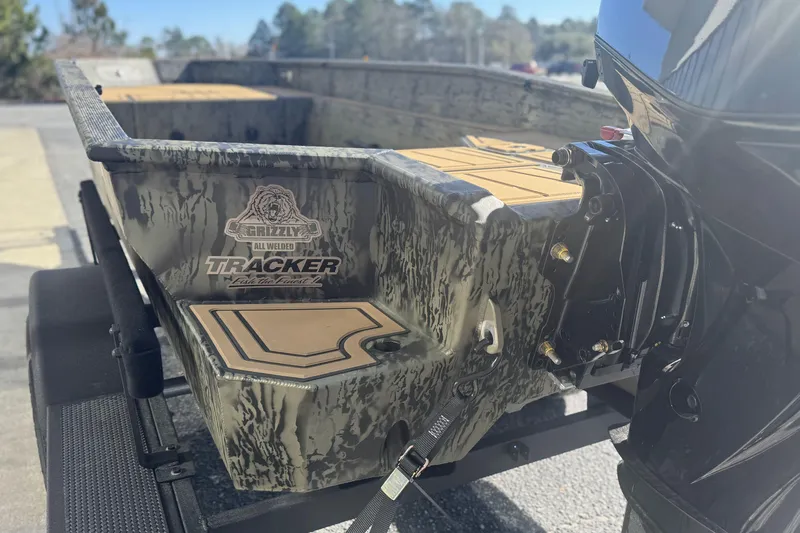 Slide: The Image of 2026 Tracker Grizzly 1650 T Prairie Wings Edition boat with camouflage design. - 10