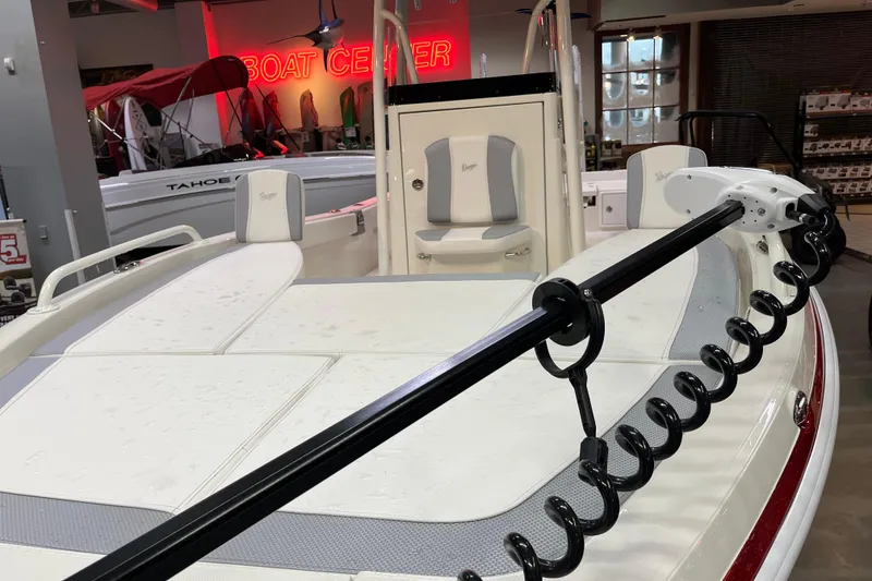 Slide: The Image of 2026 Ranger 2510 Bay boat displayed at a boat center showroom. - 6