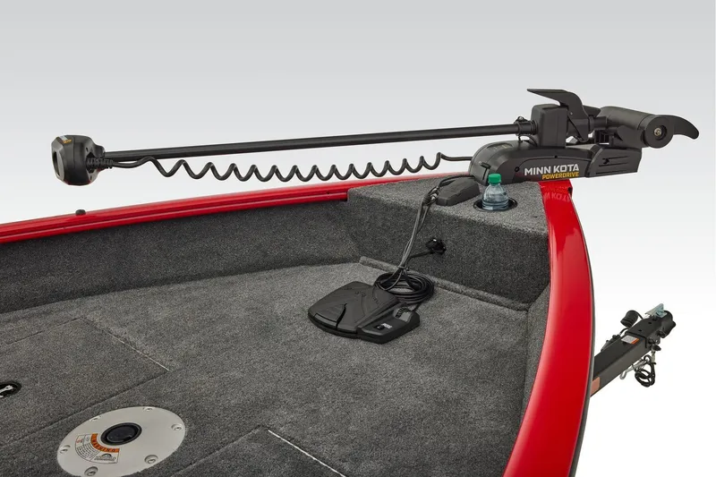 Slide: The Image of Interior of 2026 Tracker Pro Guide V-16 WT boat with control panel and seating. - 15