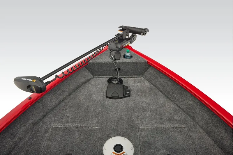 Slide: The Image of 2026 Tracker Pro Guide V-16 WT boat interior with seating and capacity label. - 16