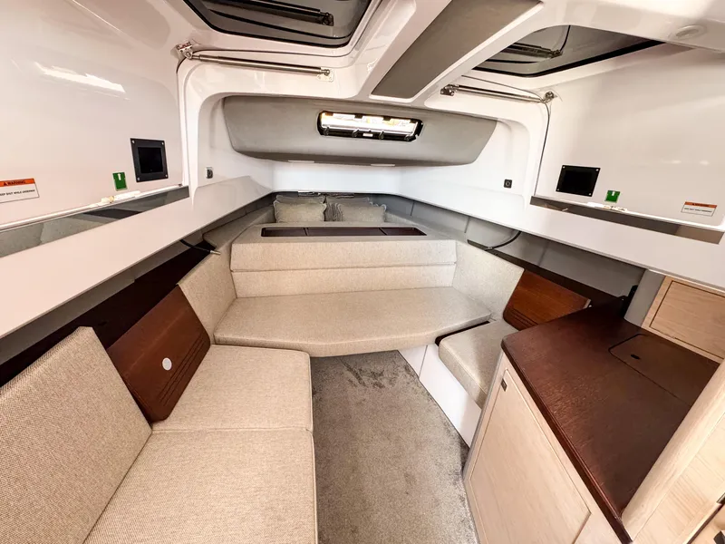 Slide: The Image of Luxurious interior of 2024 Axopar 45 ST BRABUS Trim Mediterrana boat, featuring elegant seating and modern design. - 24