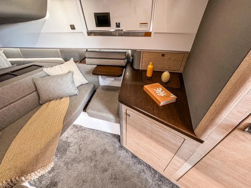 Slide: The Image of Luxurious interior of 2024 Axopar 45 ST BRABUS Trim Mediterrana with cozy seating and modern decor. - 21