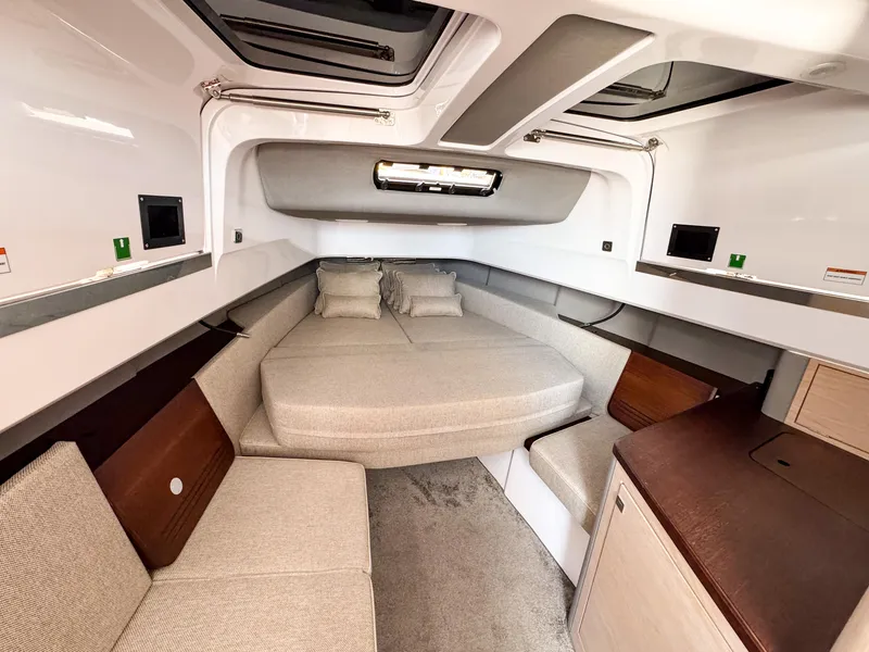 Slide: The Image of Luxurious interior of 2024 Axopar 45 ST BRABUS Trim Mediterrana boat cabin. - 25