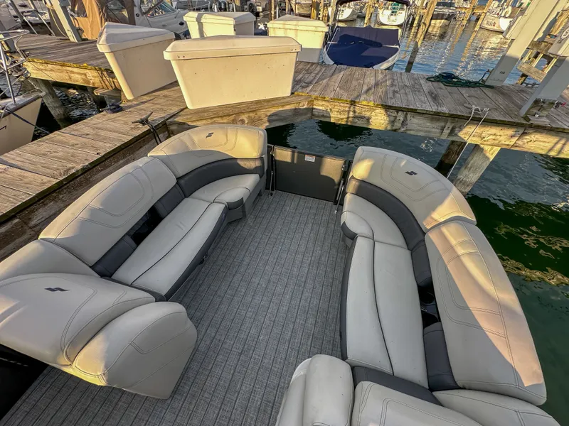 Slide: The Image of Interior of a 2021 Starcraft 25 SLS boat at the dock. - 15