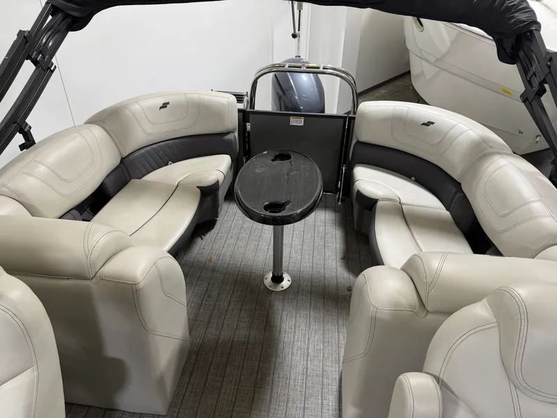 Slide: The Image of Interior of a 2021 Starcraft 25 SLS boat with gray seating. - 35