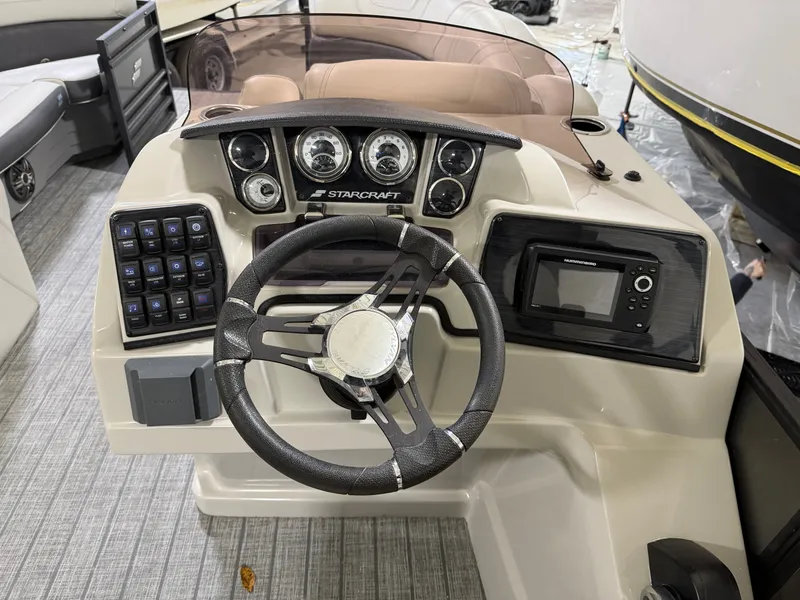 Slide: The Image of 2021 Starcraft 25 SLS boat helm with instruments. - 39