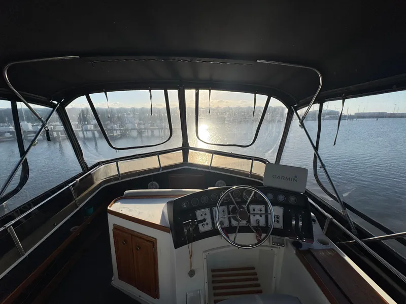 Slide: The Image of Interior view of Carver 3607 yacht with sunset. - 25