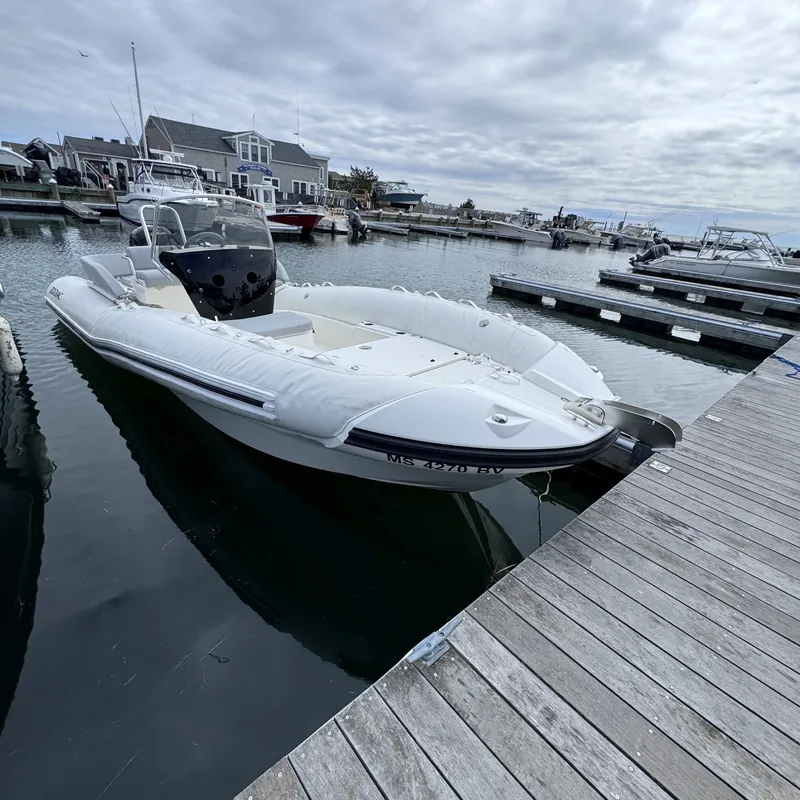 Slide: The Image of 2022 Zodiac nZO 680 boat docked at marina. - 2