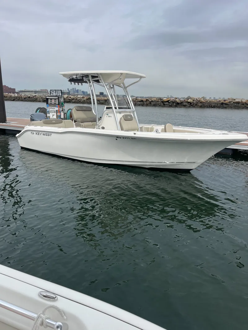 The Image of 2024 Key West 239 FS boat at dock, cloudy sky. - 0