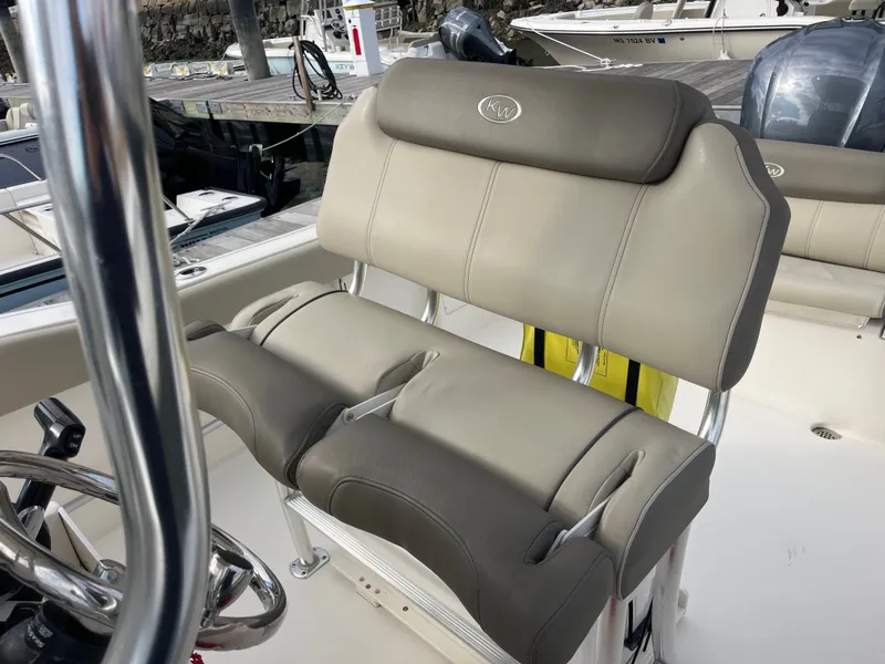 Slide: The Image of 2024 Key West 239 FS boat seat with gray upholstery. - 10