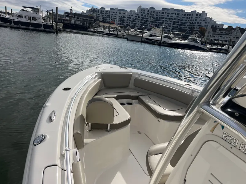 Slide: The Image of 2024 Key West 239 FS boat in harbor, modern design. - 7