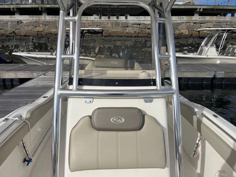 Slide: The Image of 2024 Key West 239 FS boat at dock, close-up view. - 9